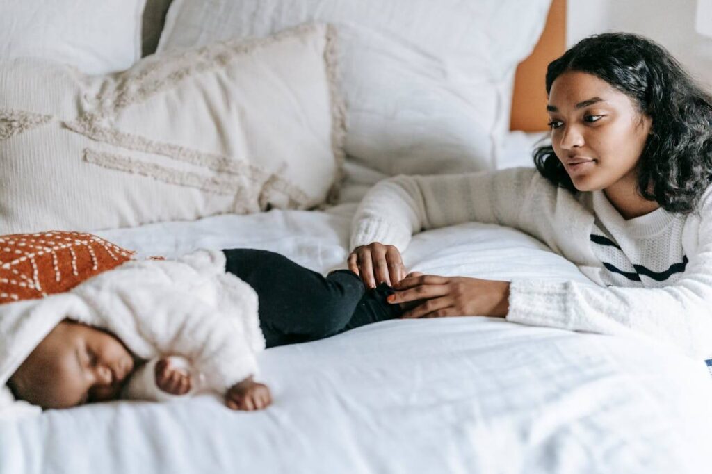 Mother watching if baby is breathing at night due to postpartum anxiety